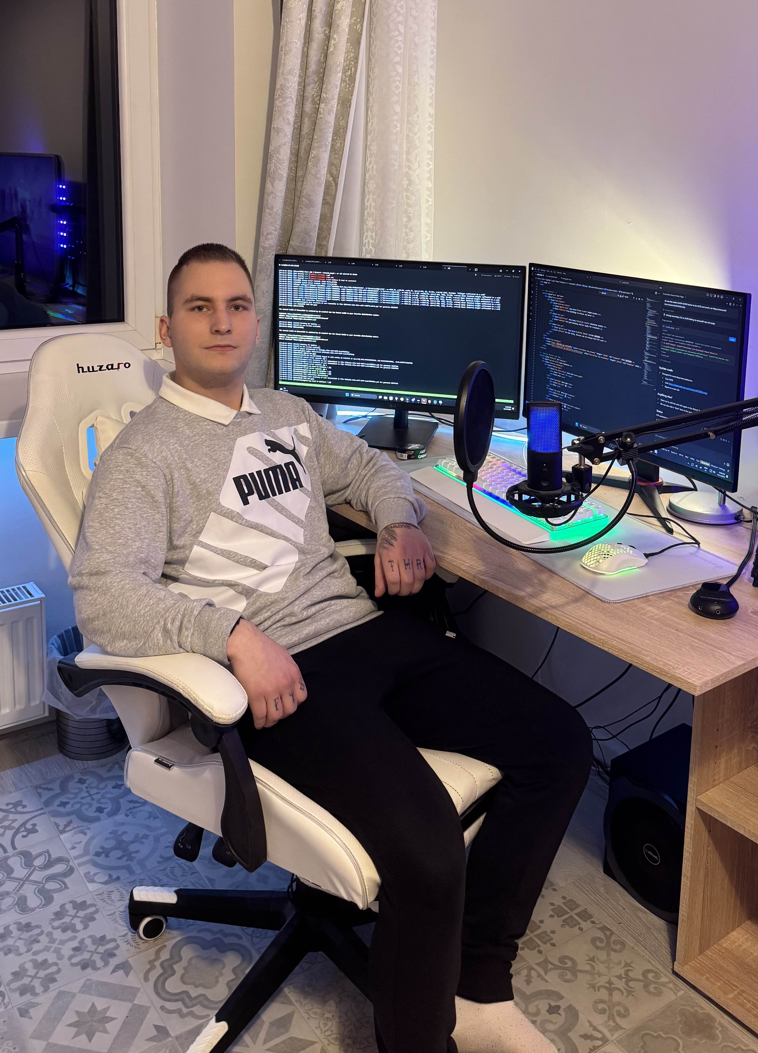 Robin at desk giving thumbs up